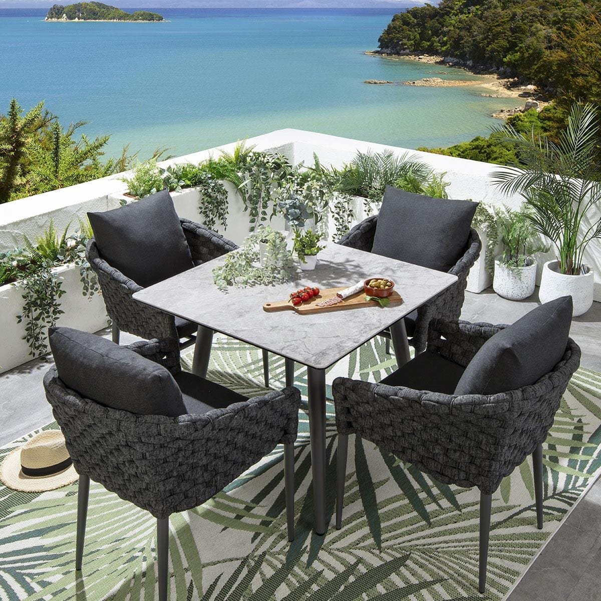 a1_e0d2a130-d7ce-45c0-8896-e3a0534324dc Luktro Outdoor Garden Patio Dining Set 4 Chairs and 1 Table Set Braided & Rope - Image 1