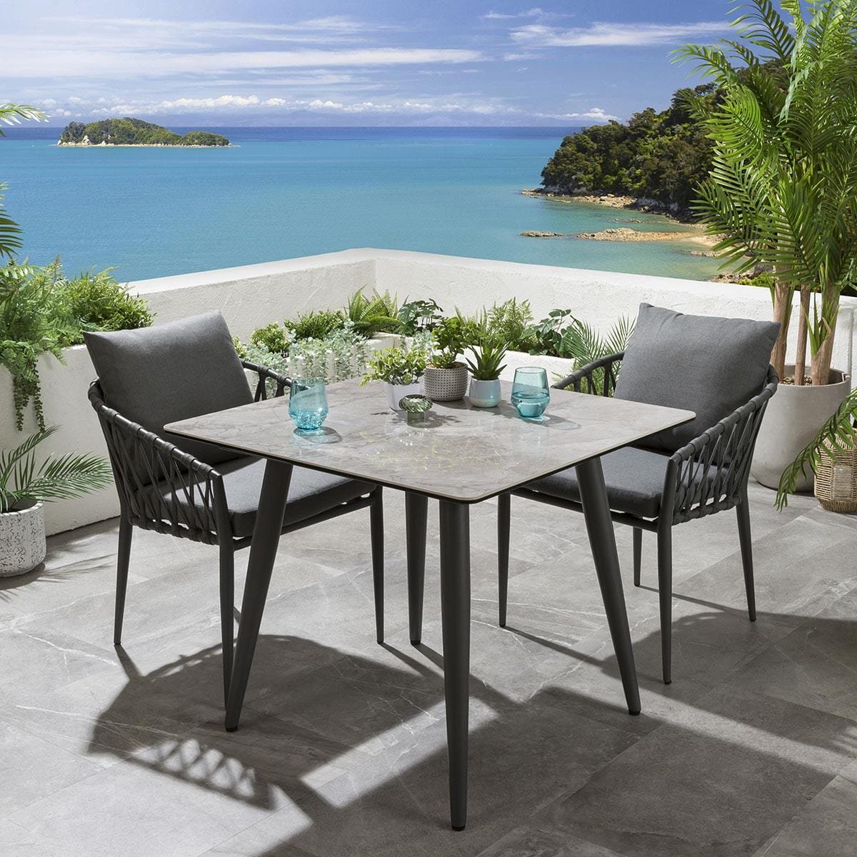 quatropi-verity-2-seater-bistro-dining-set-grey-45354925162790 Pepita Outdoor Patio Seating Set 2 Chairs and 1 Table Set Braided & Rope - Image 1